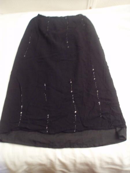 Jupe noire avec perles et paillettes